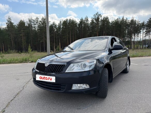 2011 Skoda Octavia II (A5) Рестайлинг, чёрный, 600000 рублей - вид 1