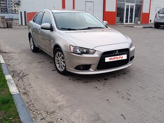 2012 Mitsubishi Lancer X Рестайлинг, серебристый, 780000 рублей, вид 3