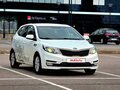 2015 Kia Rio III Рестайлинг, белый, 767000 рублей