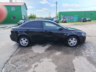 2013 Mitsubishi Lancer X Рестайлинг, чёрный, 700000 рублей, вид 4