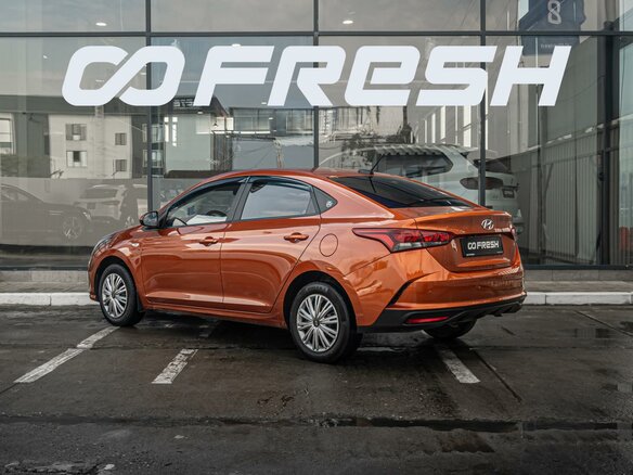 2021 Hyundai Solaris II Рестайлинг, оранжевый, 1445000 рублей - вид 1