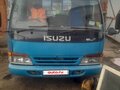 1995 Isuzu Elf (N-series), синий, 1200000 рублей - вид 2