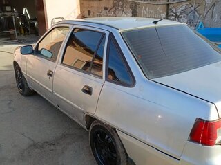 2012 Daewoo Nexia I Рестайлинг, серебристый, 149000 рублей, вид 4