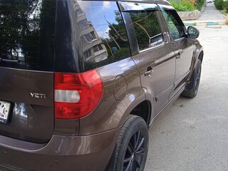 2014 Skoda Yeti I Рестайлинг, коричневый, 910000 рублей, вид 4