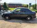 2005 Hyundai Accent ТагАЗ II, чёрный - вид 1