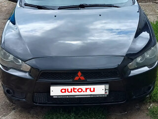 2013 Mitsubishi Lancer X Рестайлинг, чёрный, 560000 рублей, вид 1