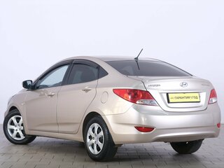 2011 Hyundai Solaris I, бежевый, 869000 рублей, вид 4