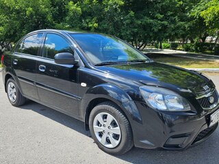 2011 Kia Rio II Рестайлинг, чёрный, 550000 рублей, вид 2