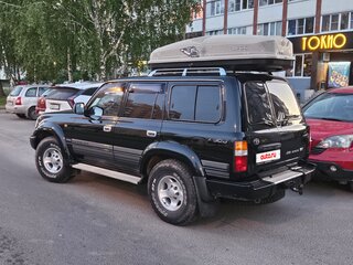 1996 Toyota Land Cruiser 80 Series Рестайлинг, чёрный, 1850000 рублей, вид 3
