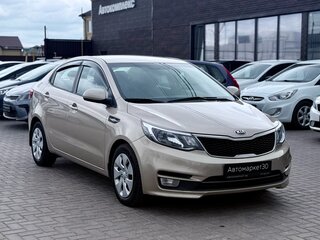 2015 Kia Rio III Рестайлинг, бежевый, 999990 рублей, вид 1
