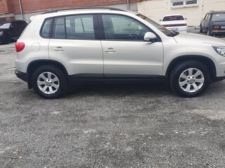2012 Volkswagen Tiguan I Рестайлинг, серебристый, 1400000 рублей, вид 3