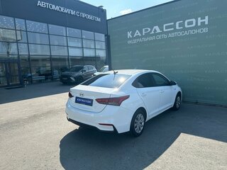 2019 Hyundai Solaris II, белый, 945000 рублей, вид 2
