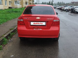 2010 Chevrolet Aveo I Рестайлинг, красный, 385000 рублей, вид 4