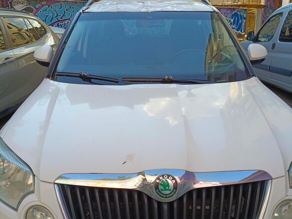 2013 Skoda Yeti I, белый - вид 1