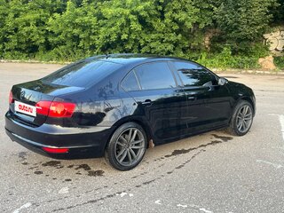 2011 Volkswagen Jetta VI, чёрный, 830000 рублей, вид 4