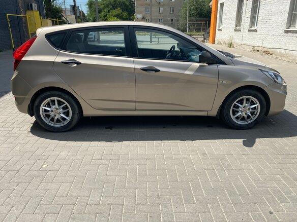 2012 Hyundai Solaris I, бежевый - вид 1