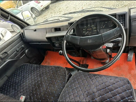1987 Isuzu Elf (N-series), белый, 600000 рублей, вид 4