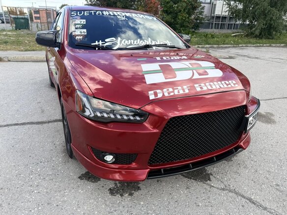 2010 Mitsubishi Lancer X, красный, 1399999 рублей - вид 11