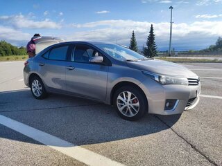 2014 Toyota Corolla XI (E160, E170, E180), коричневый, 1305000 рублей, вид 1