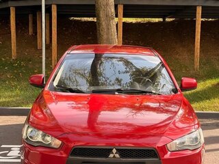 2008 Mitsubishi Lancer X, красный, 690000 рублей, вид 2