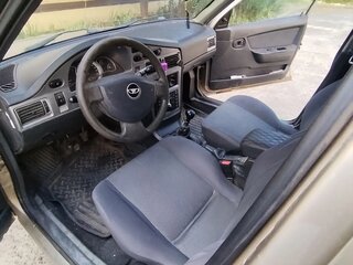 2012 Daewoo Nexia I Рестайлинг, серебристый, 220000 рублей, вид 3