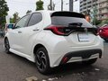 2023 Toyota Yaris IV, белый, 1150400 рублей - вид 6