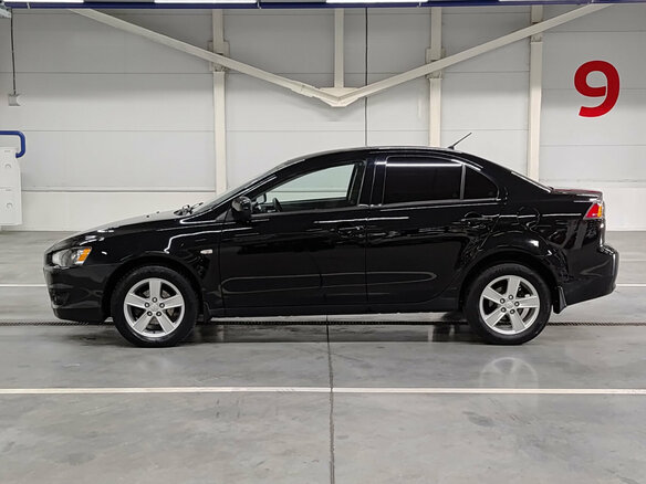 2010 Mitsubishi Lancer X, чёрный - вид 7