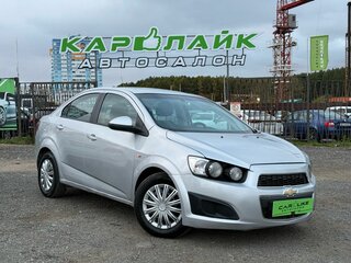 2013 Chevrolet Aveo II, серебристый, 629000 рублей, вид 1