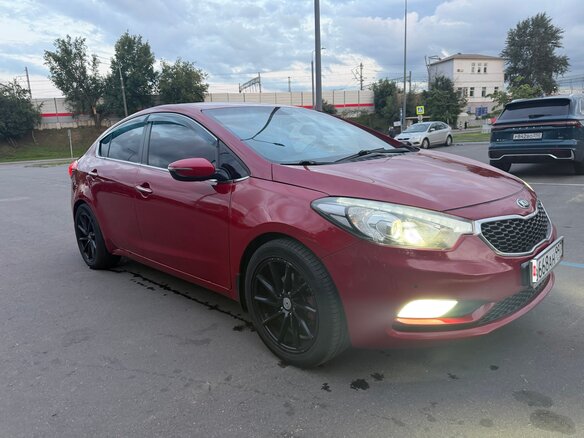 2014 Kia Cerato III, красный