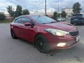 2014 Kia Cerato III, красный