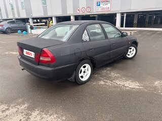 1997 Mitsubishi Lancer VII, чёрный, 65000 рублей, вид 4