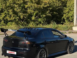 2010 Mitsubishi Lancer X, чёрный, 690000 рублей, вид 4