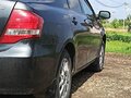 2010 Toyota Corolla Axio X (E140, E150) Рестайлинг, серый, 800000 рублей - вид 3