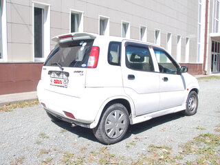 2001 Suzuki Swift I (Japan), белый, 265000 рублей, вид 4