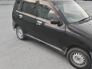 2000 Nissan Cube I Рестайлинг (Z10), чёрный, 180000 рублей, вид 4
