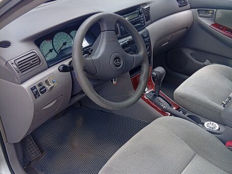 2004 Toyota Corolla IX (E120, E130) Рестайлинг, серебристый, 350000 рублей, вид 5