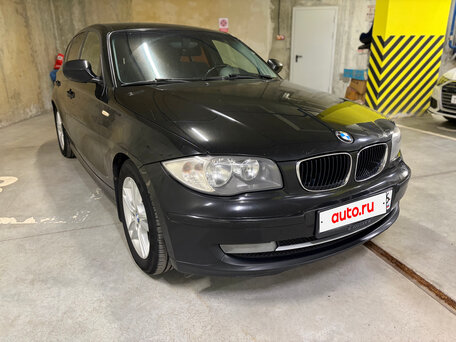 2011 BMW 1 серии 118i I (E81/E82/E87/E88) Рестайлинг, чёрный, вид 1