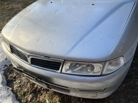 1999 Mitsubishi Lancer VII, серебристый, 140000 рублей, вид 1
