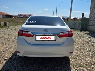 2013 Toyota Corolla XI (E160, E170, E180), белый, 1030000 рублей, вид 3