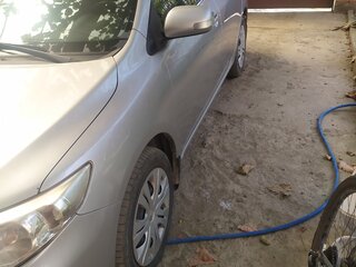2012 Toyota Corolla X (E140, E150) Рестайлинг, серебристый, 1100000 рублей, вид 2