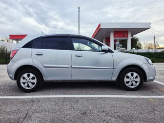 2011 Kia Rio II Рестайлинг, серебристый, 650000 рублей, вид 4