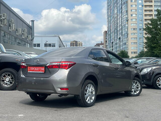 2014 Toyota Corolla XI (E160, E170, E180), серый, 999000 рублей, вид 4
