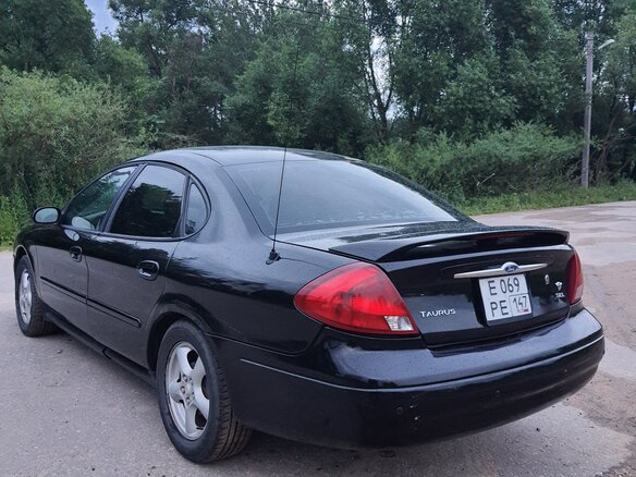 2001 Ford Taurus IV, чёрный - вид 9
