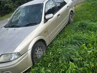 2001 Ford Laser IV, бежевый, 140000 рублей, вид 1