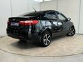 2012 Kia Rio 5-speed III, чёрный, 900000 рублей - вид 4