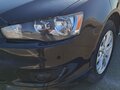 2010 Mitsubishi Lancer X, чёрный, 629000 рублей - вид 4