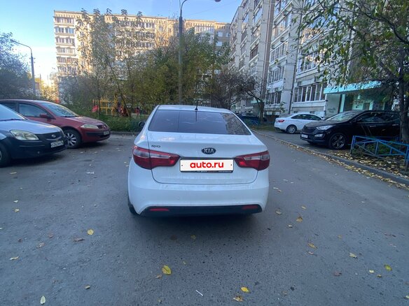2014 Kia Rio 4-speed III, белый - вид 1