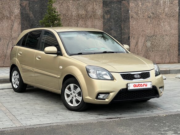 2011 Kia Rio II Рестайлинг, бежевый - вид 8