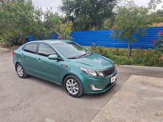 2012 Kia Rio 5-speed III, зелёный, 650000 рублей, вид 3