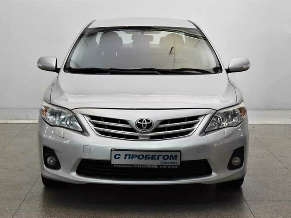 2010 Toyota Corolla X (E140, E150) Рестайлинг, серебристый - вид 1